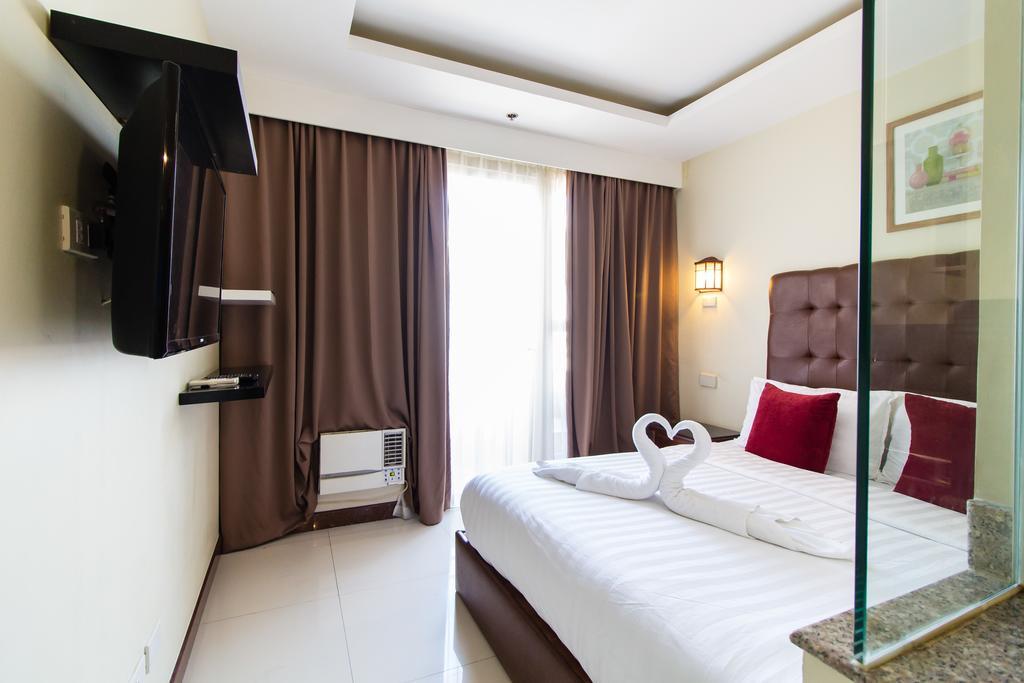 Jmm Apartment Suites Manila Esterno foto