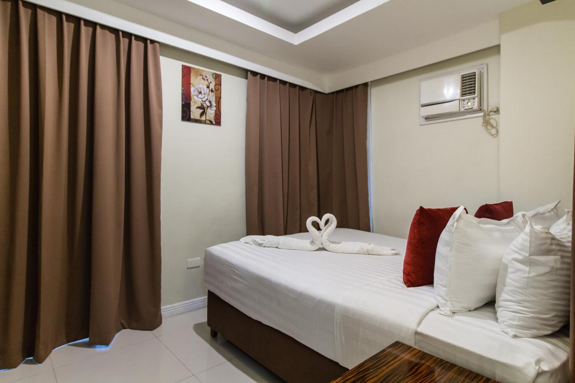 Jmm Apartment Suites Manila Esterno foto