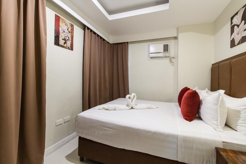 Jmm Apartment Suites Manila Esterno foto