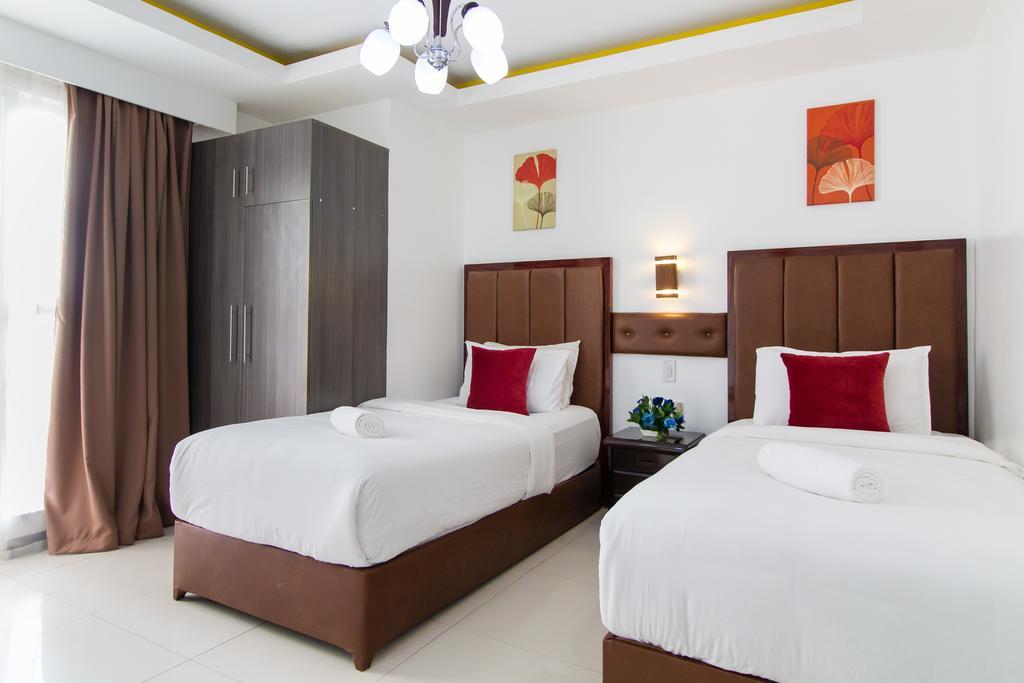 Jmm Apartment Suites Manila Esterno foto