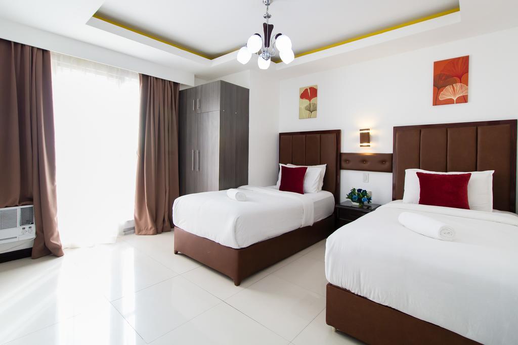 Jmm Apartment Suites Manila Esterno foto
