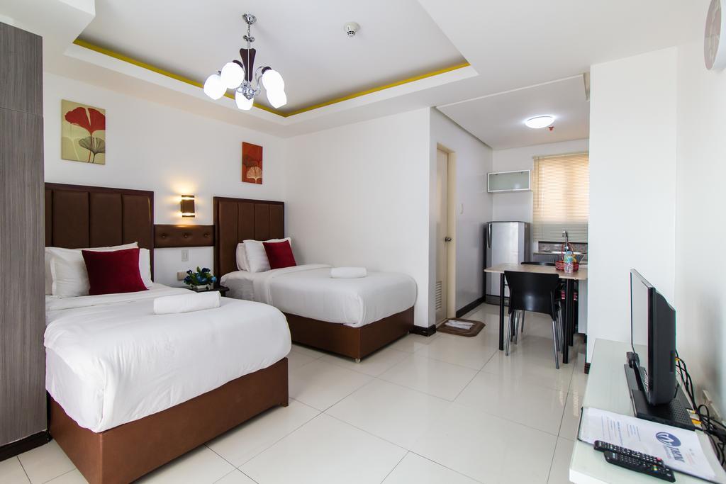 Jmm Apartment Suites Manila Esterno foto